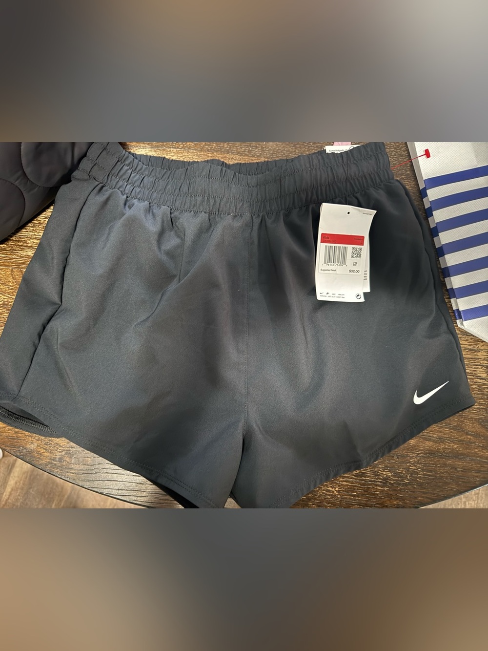 Nike Black Athletic Running Shorts with White Swoosh